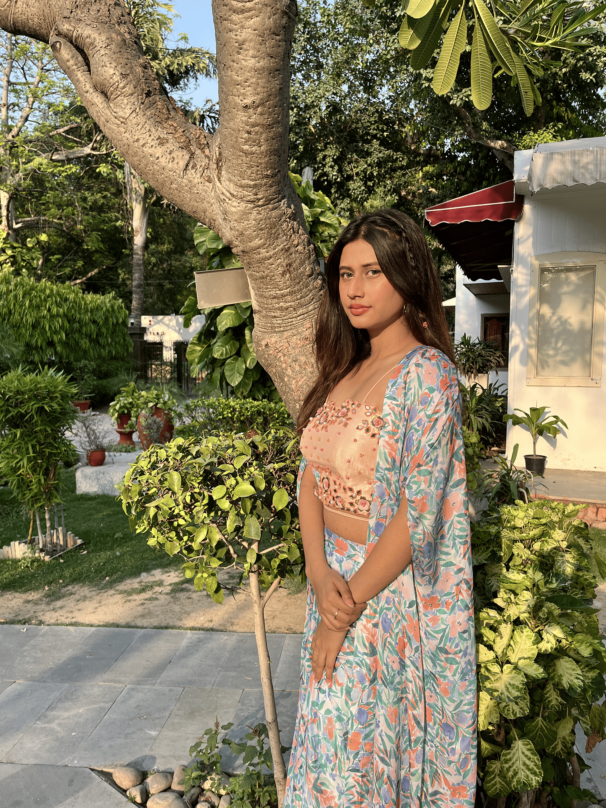 Peach embroidered blouse with leaves printed dhoti set