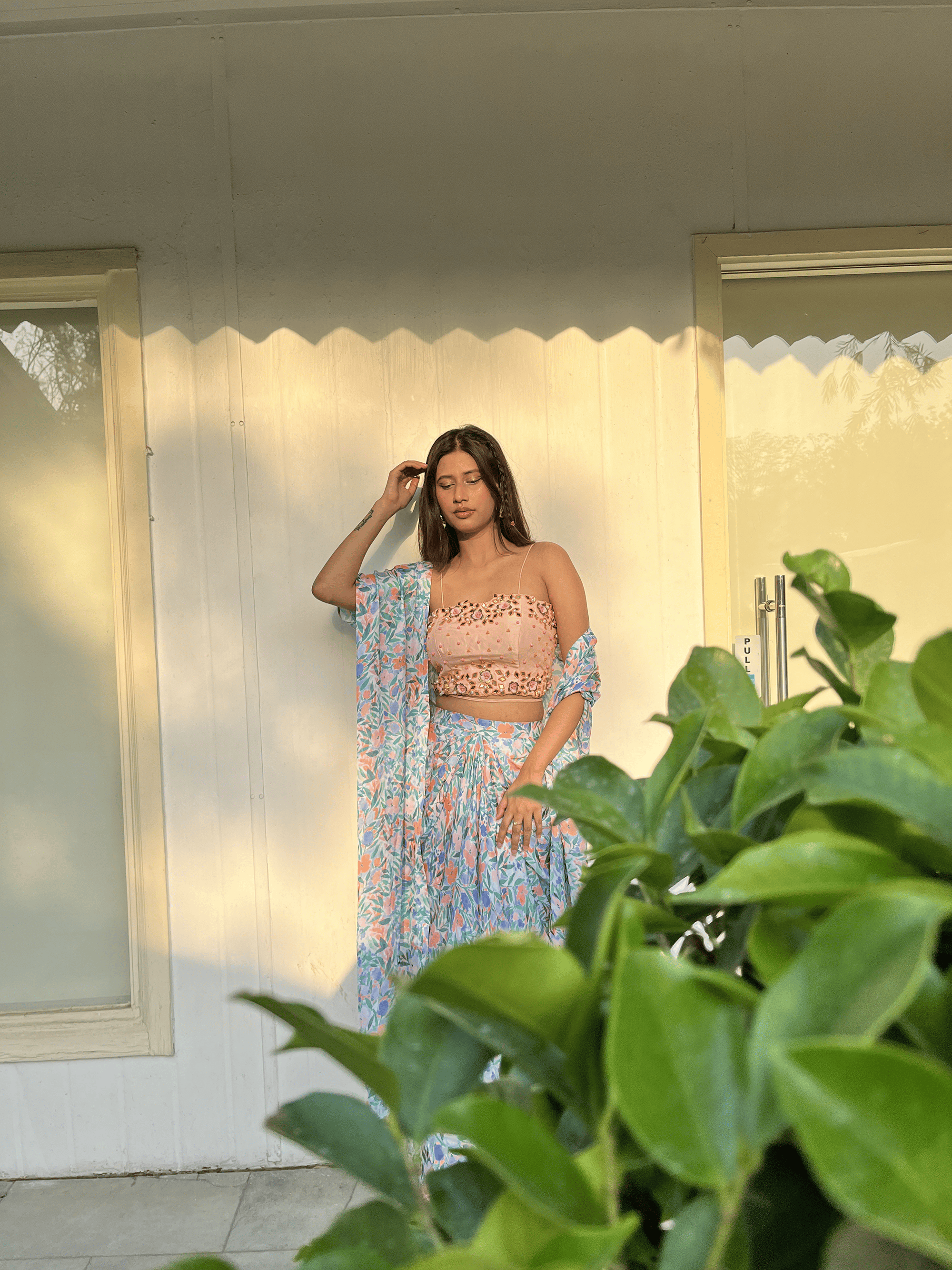 Peach embroidered blouse with leaves printed dhoti set