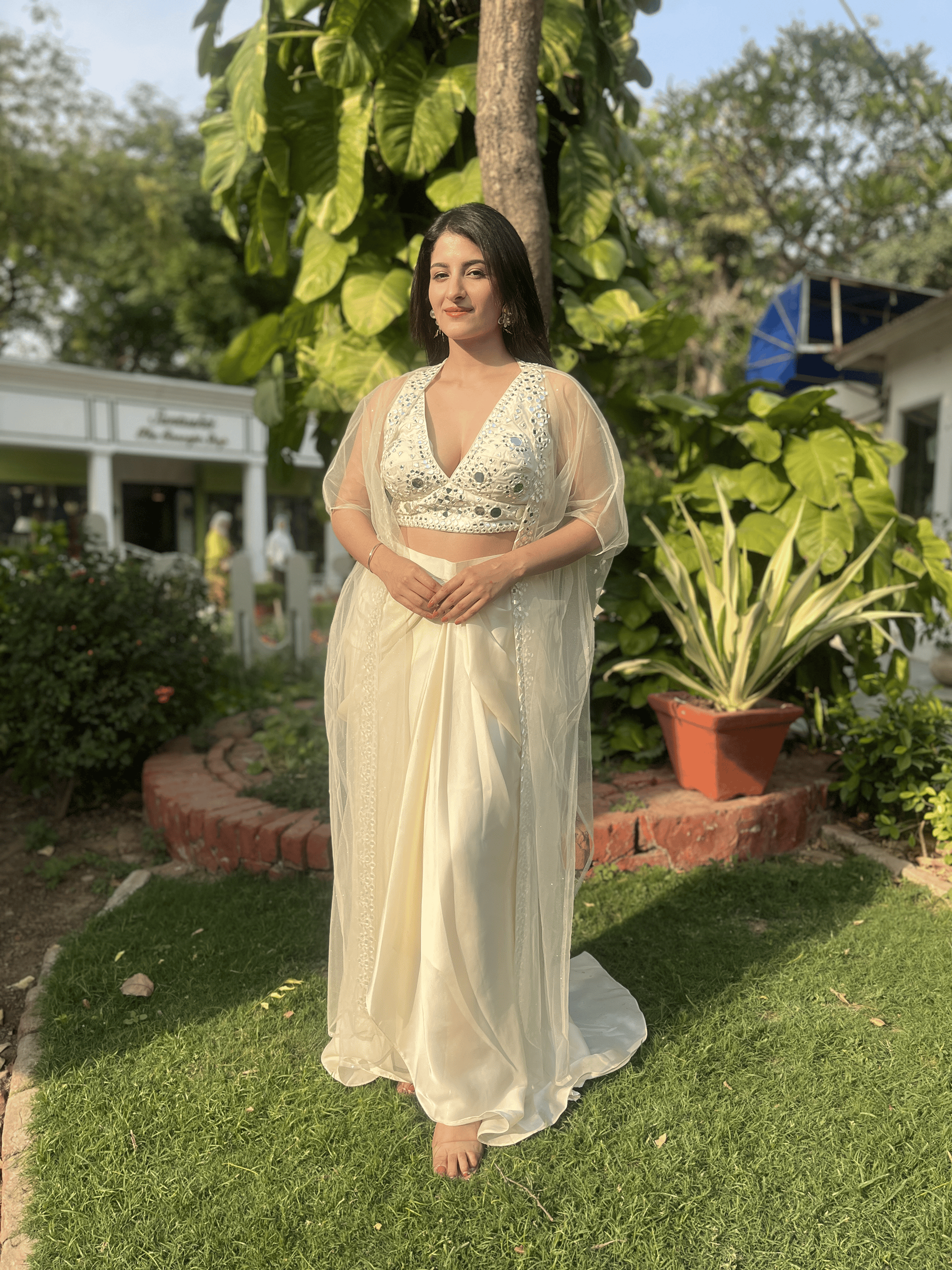 White mirror embroidedred dhoti set with cape