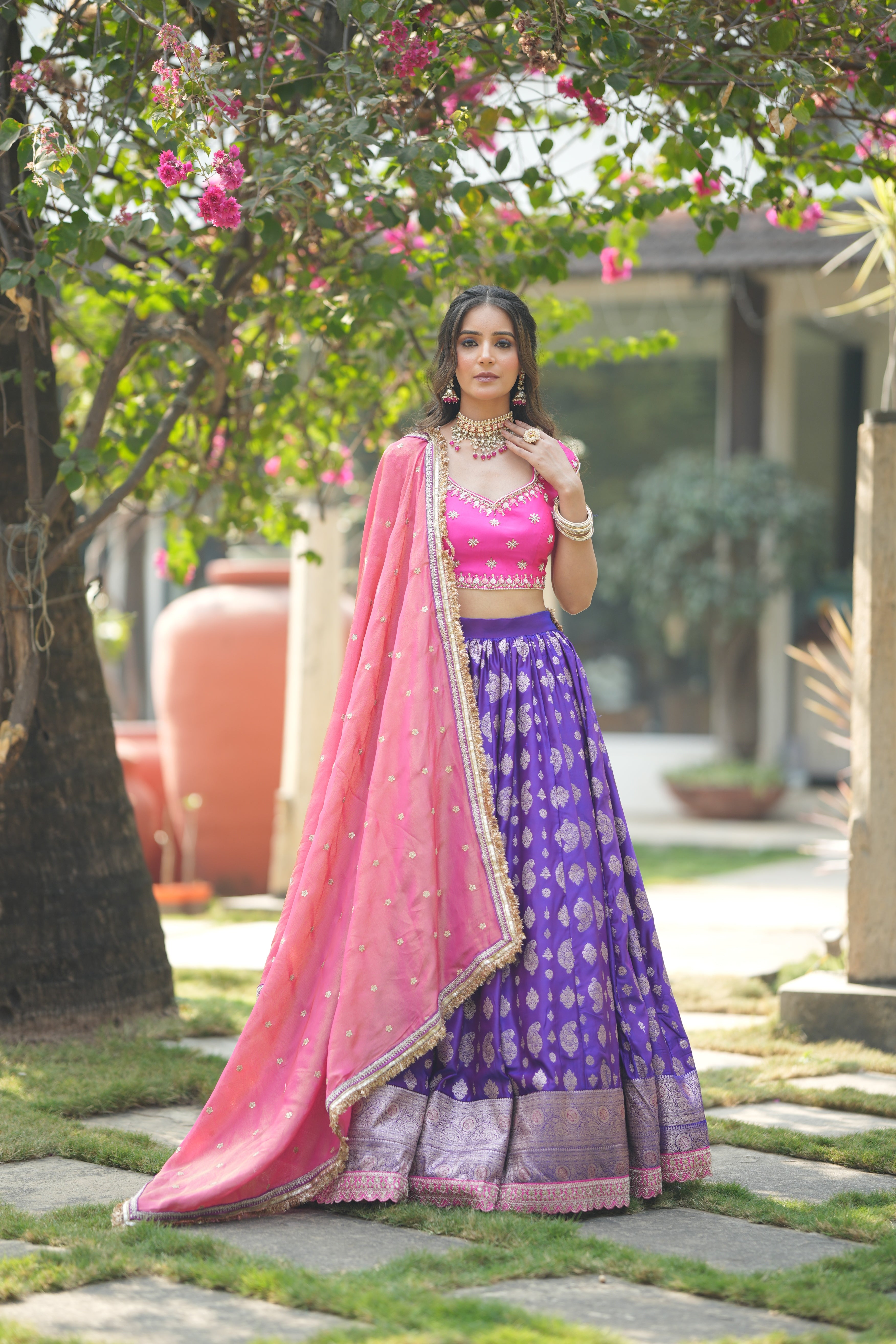 Full bridal look of Pink-Purple Banarasi lehenga with dupatta styled for wedding wear