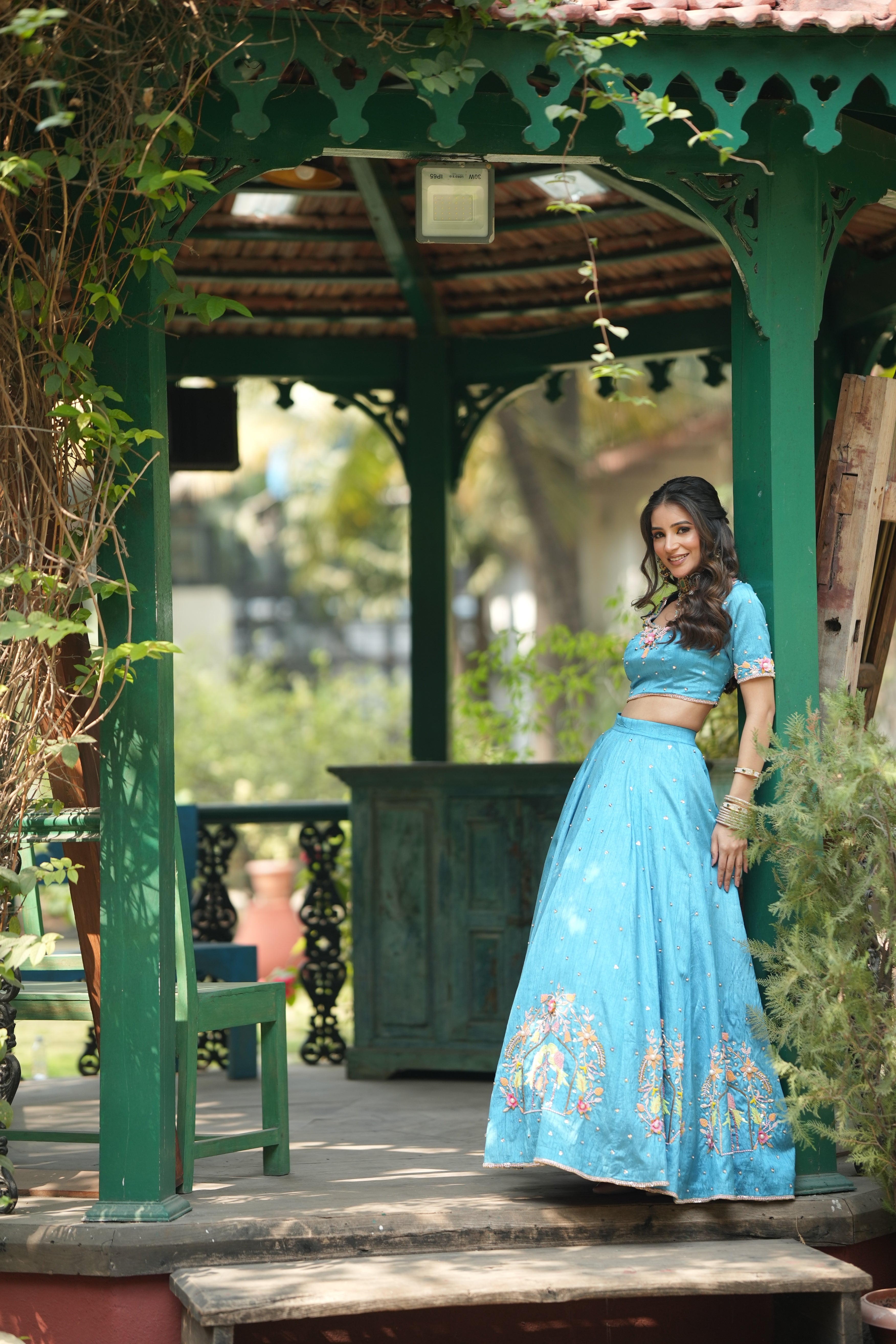 Aviary bloom flared sky blue lehenga with peacock embroidery at the hem