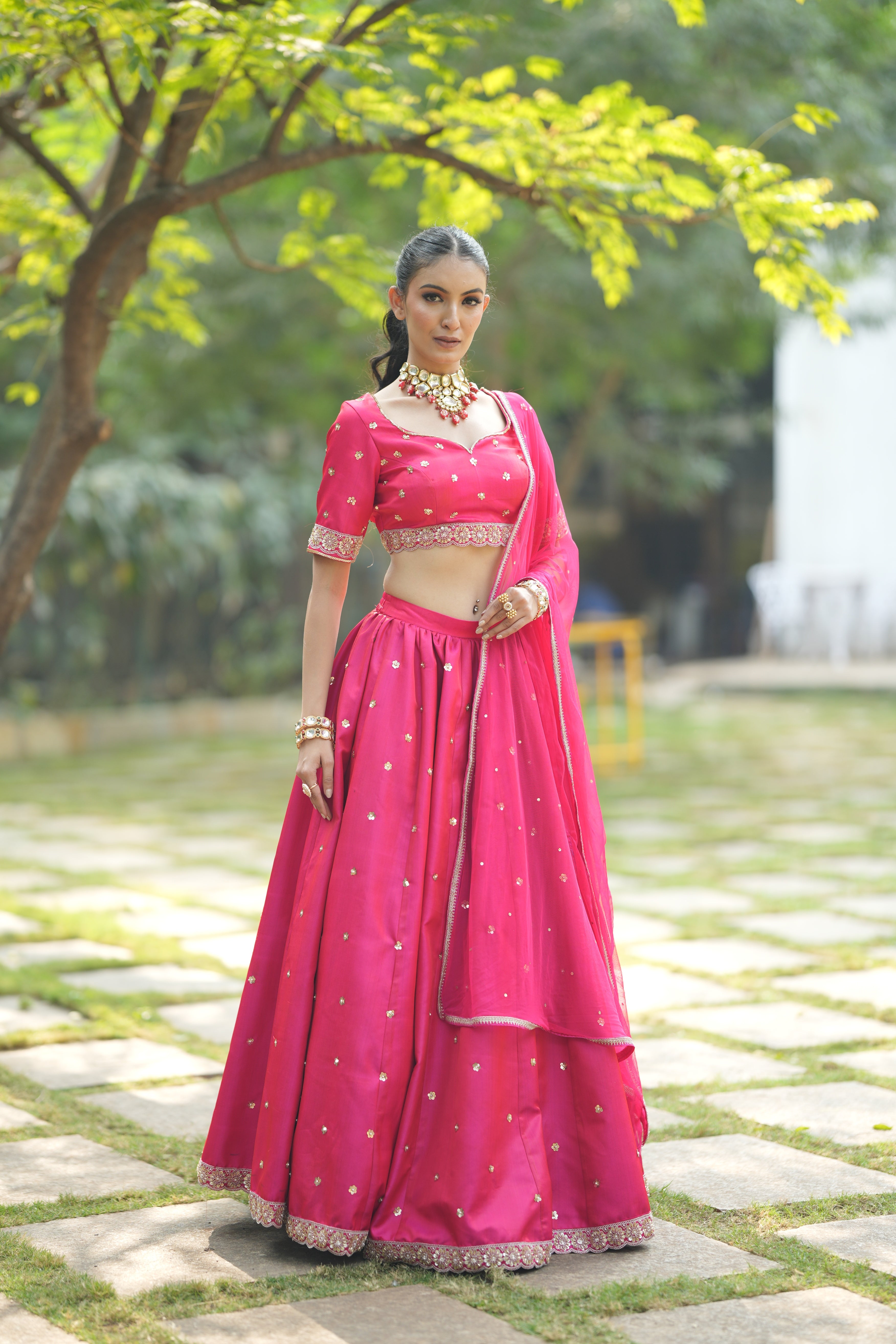 Complete bridal ensemble featuring the Designer Red Silk Bridal Lehenga, showcasing the elegance and sophistication of the wedding attire.