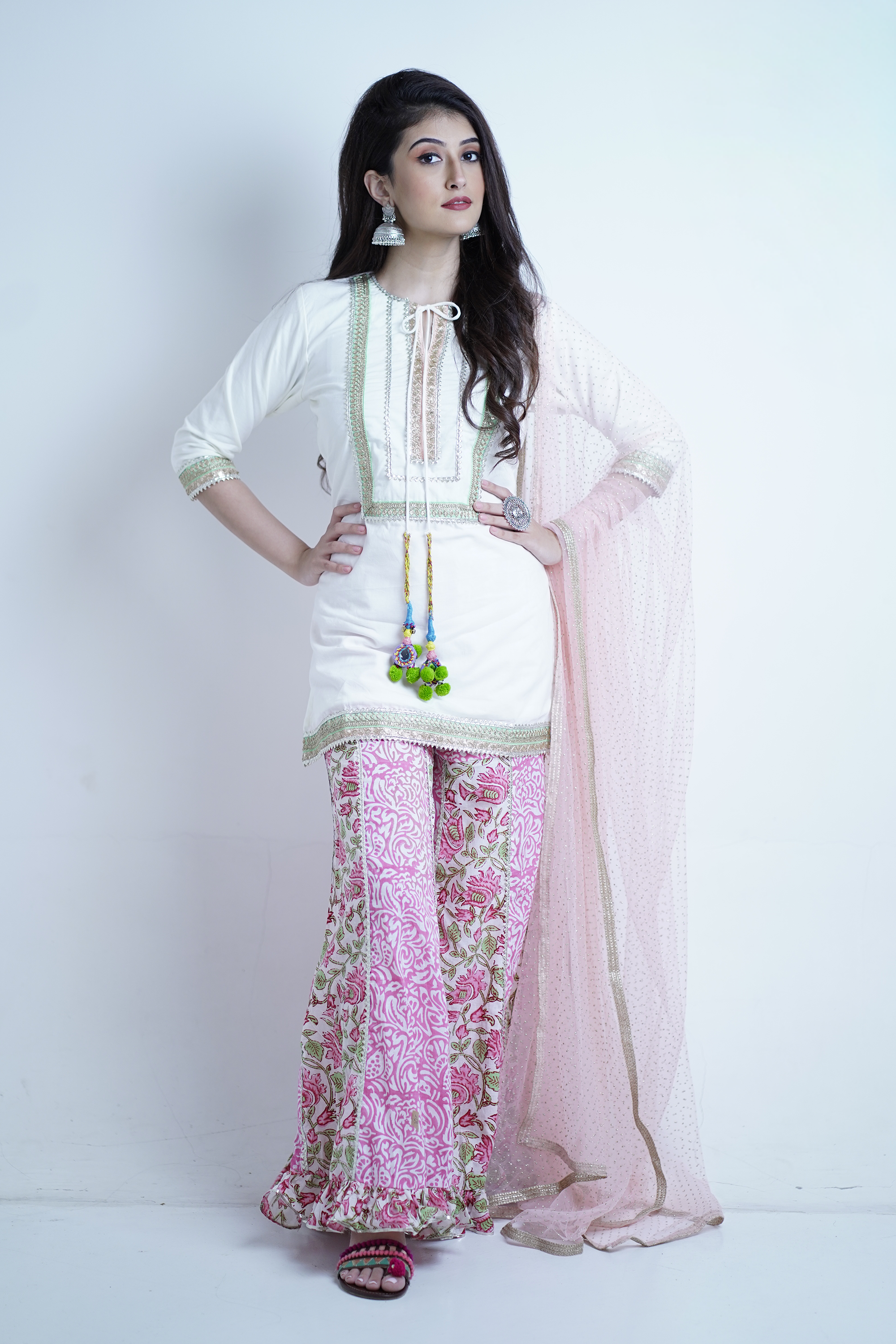 designer white kurta palazzo set with printed pants for women
