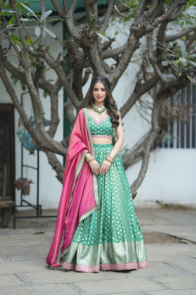 golden zari buti work on the Emerald Opulence Green Banarasi Lehenga