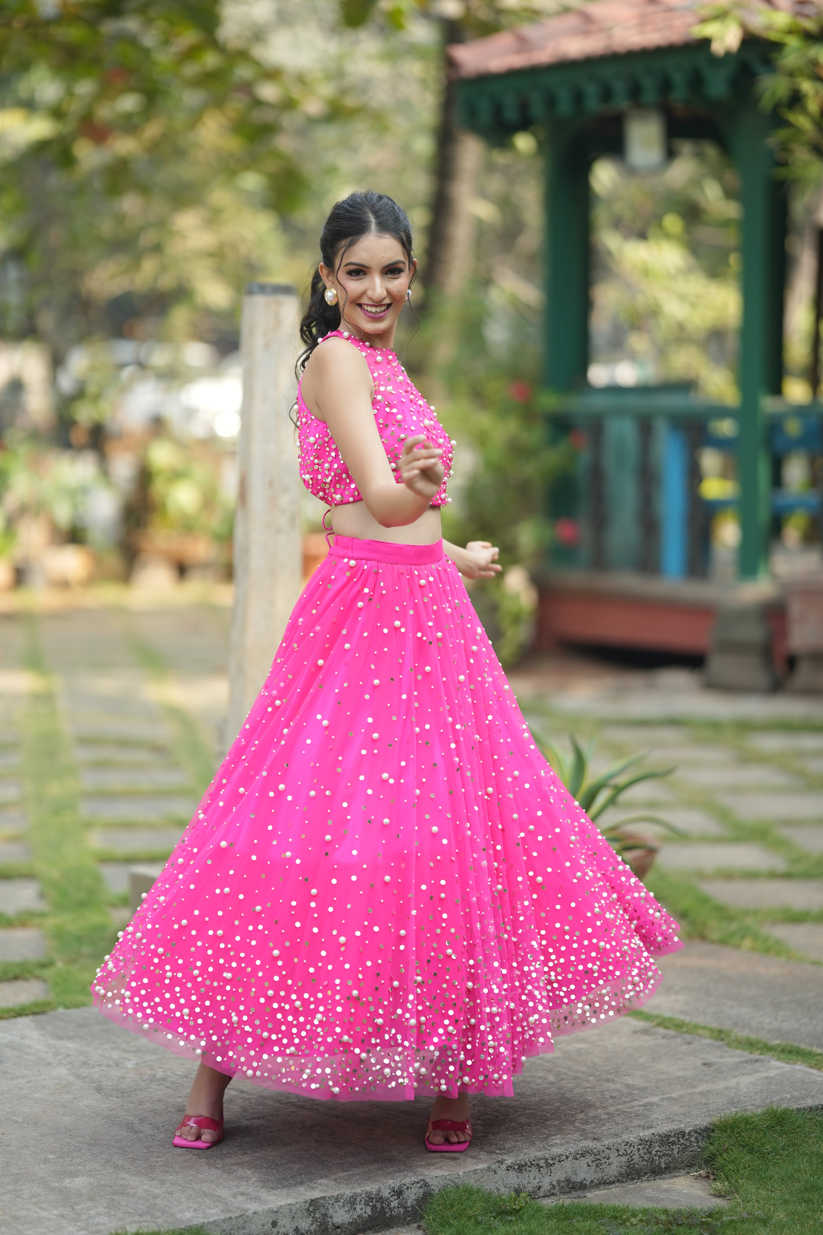 wirl-ready flared pink lehenga choli ideal for wedding party dancing.