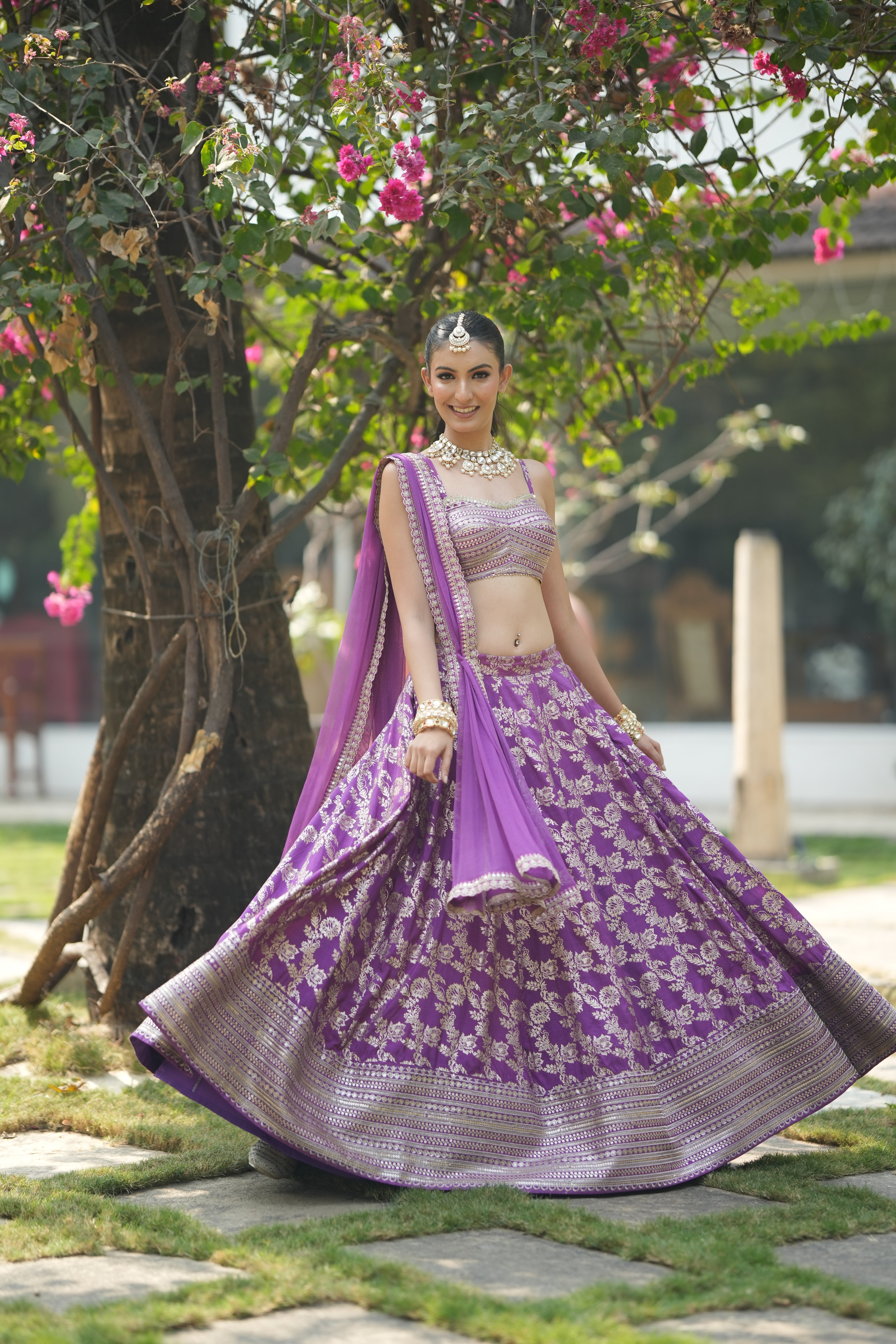 Lavender bridal lehenga with zari work – front view showing full flair and embroidery details.