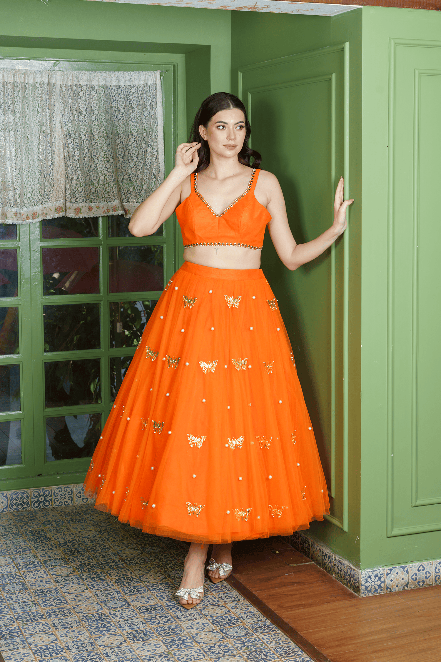 orange lehenga choli with pearl accents for party wear
