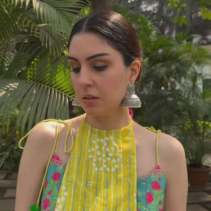 Festive yellow Anarkali kurta set for weddings and cultural events.