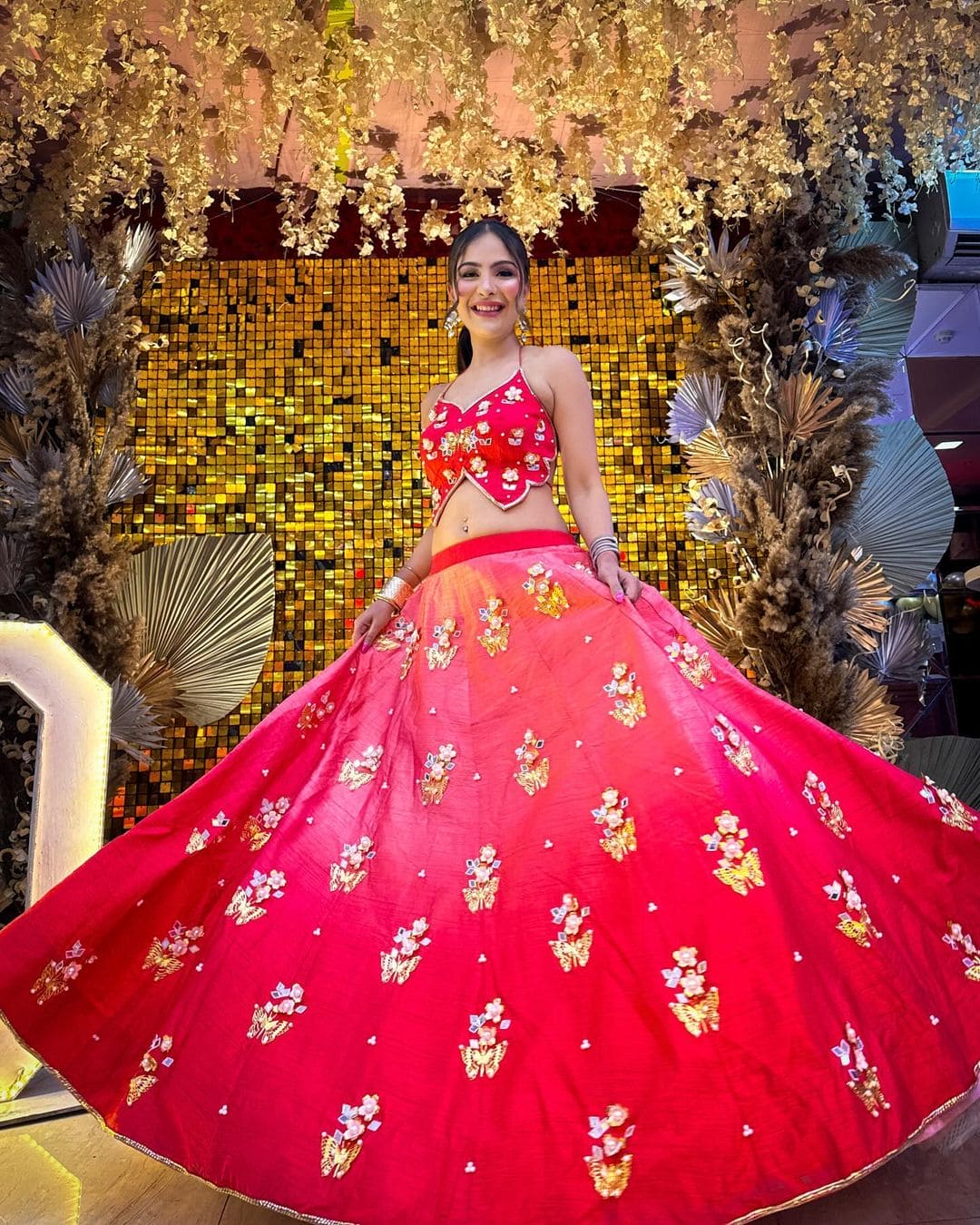 Designer red ombre bridal lehenga set with embroidered butterfly blouse.