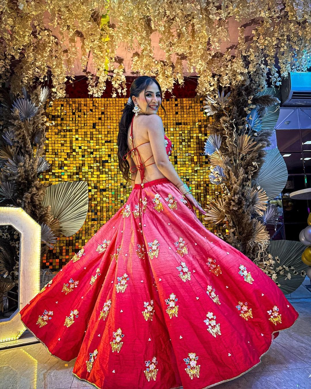 Red ombre embroidered silk bridal lehenga with floral hand embroidery
