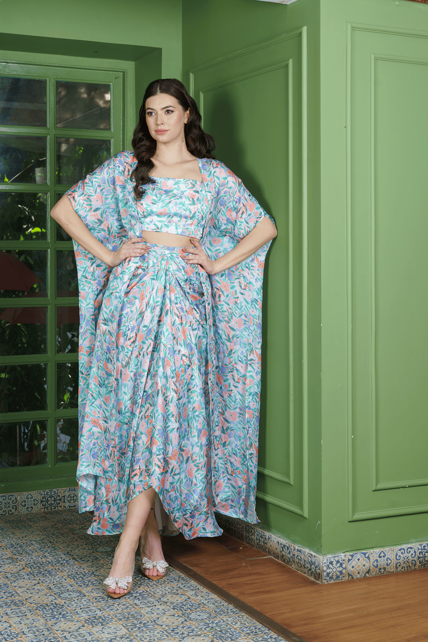 Trendy leafy print dhoti set for women featuring a crop top, draped skirt, and long jacket – stylish indo western fusion wear for festive occasions.