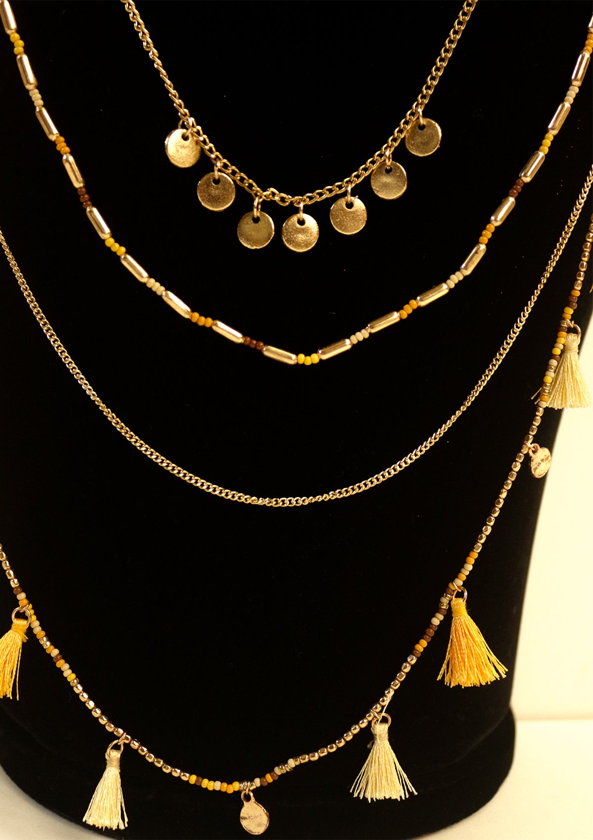 Multilayered tasseled necklace