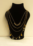 Multilayered tasseled necklace