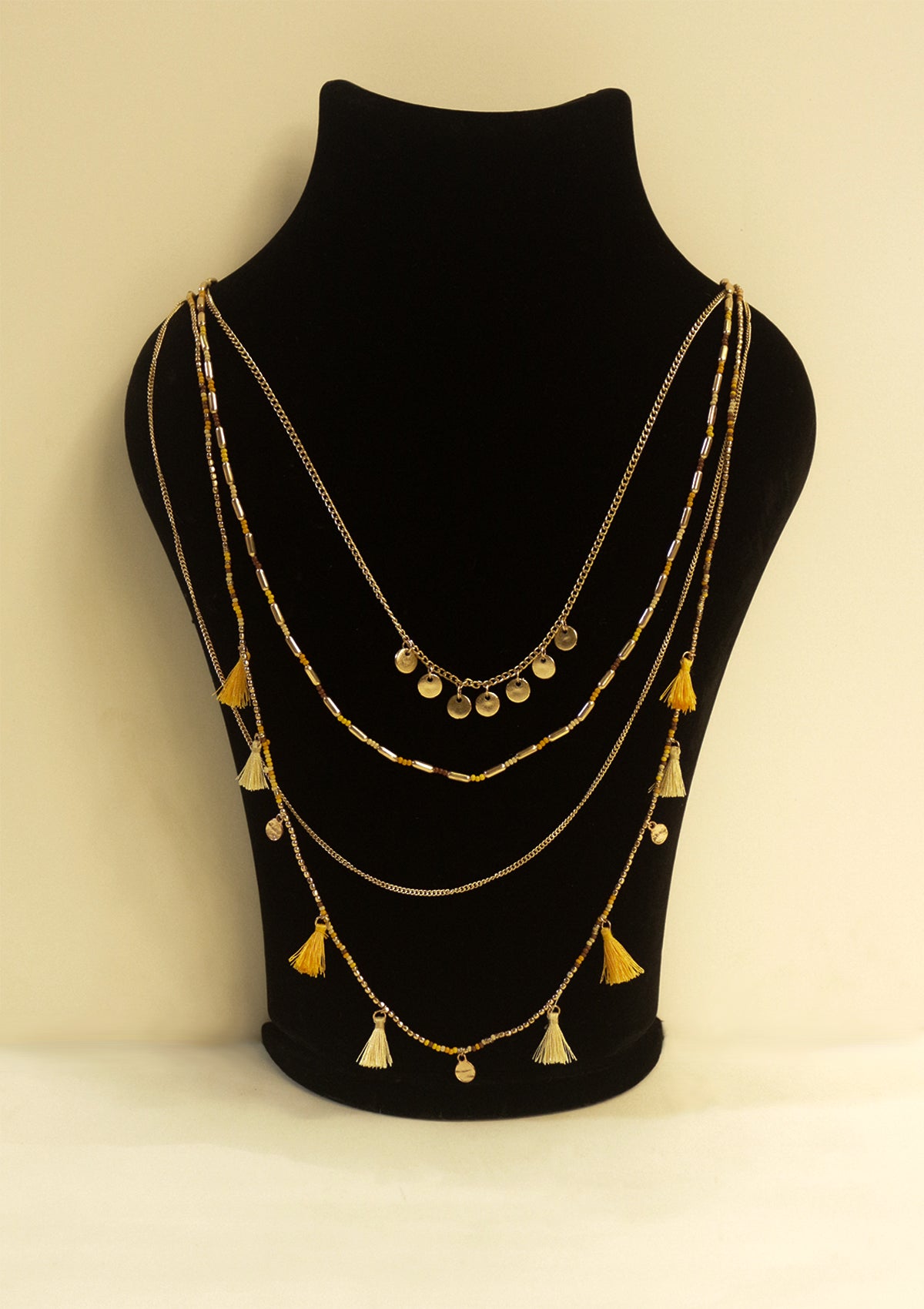 Multilayered tasseled necklace