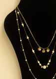 Multilayed bohemian pearl necklace