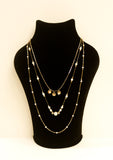 Multilayed bohemian pearl necklace
