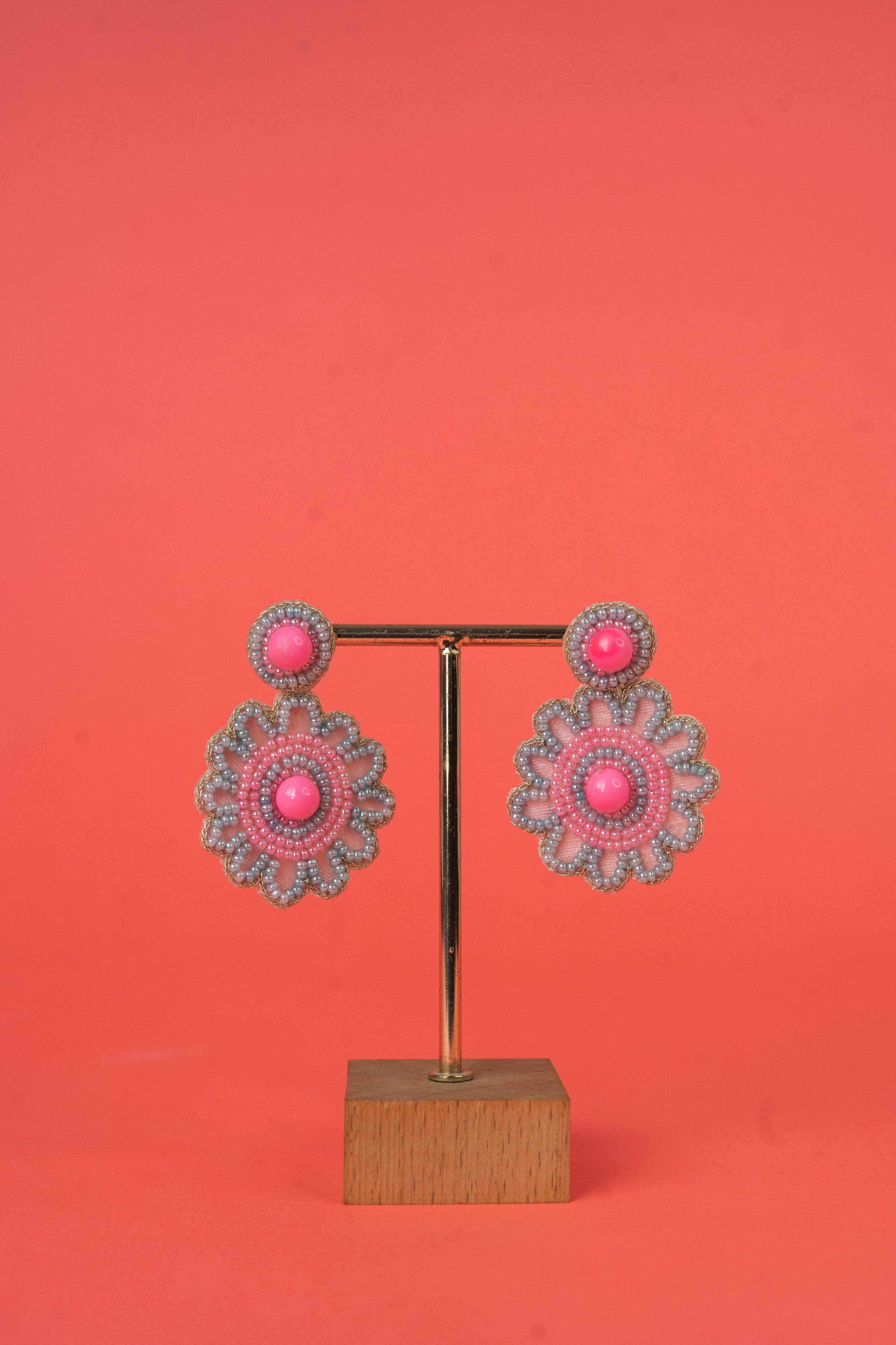 Pink circular beaded earrings