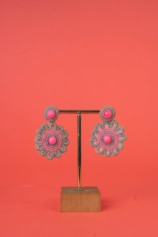 Pink circular beaded earrings