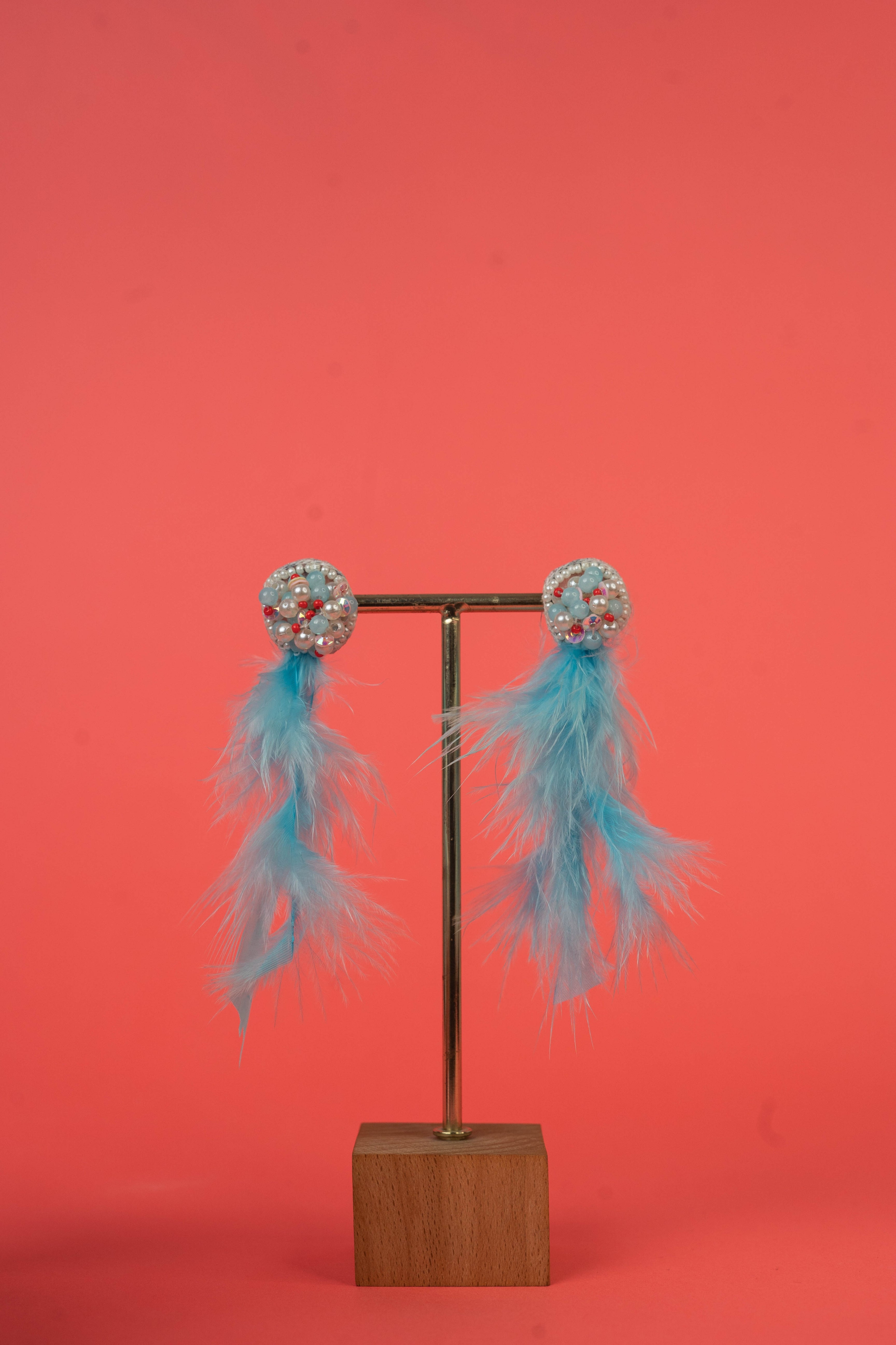 Blue feather beaded earrings