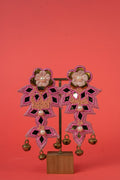 Floral pink beaded earrings with ghungroo hanging.