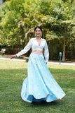 White overlap shirt with blue hand embroidered lehenga