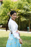 White overlap shirt with blue hand embroidered lehenga