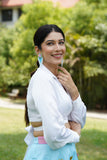 White overlap shirt with blue hand embroidered lehenga