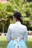 White overlap shirt with blue hand embroidered lehenga
