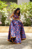 Blue handembroidered lehenga with blouse .