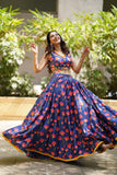 Blue handembroidered lehenga with blouse .