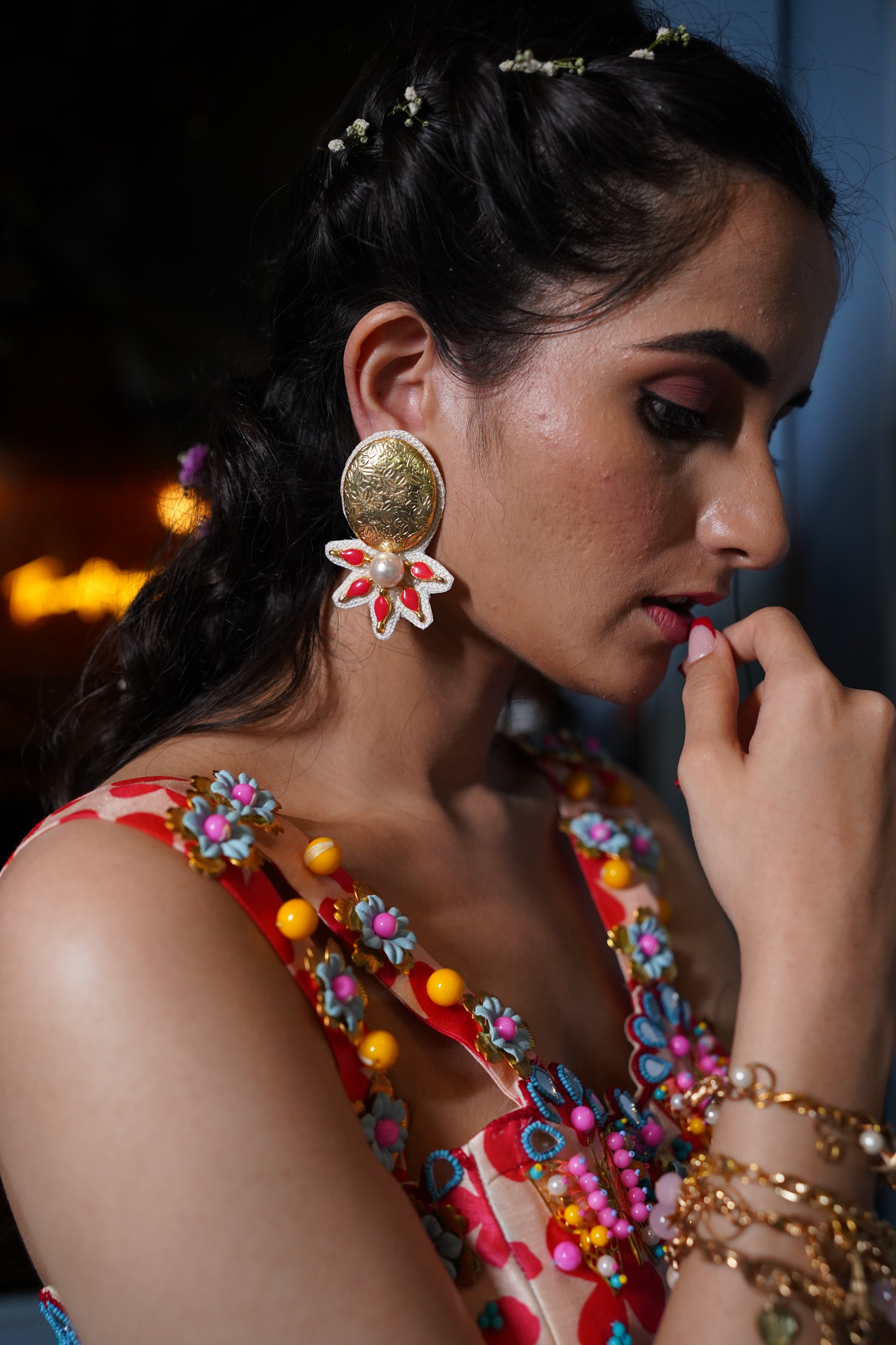 Golden statement handcrafted earrings