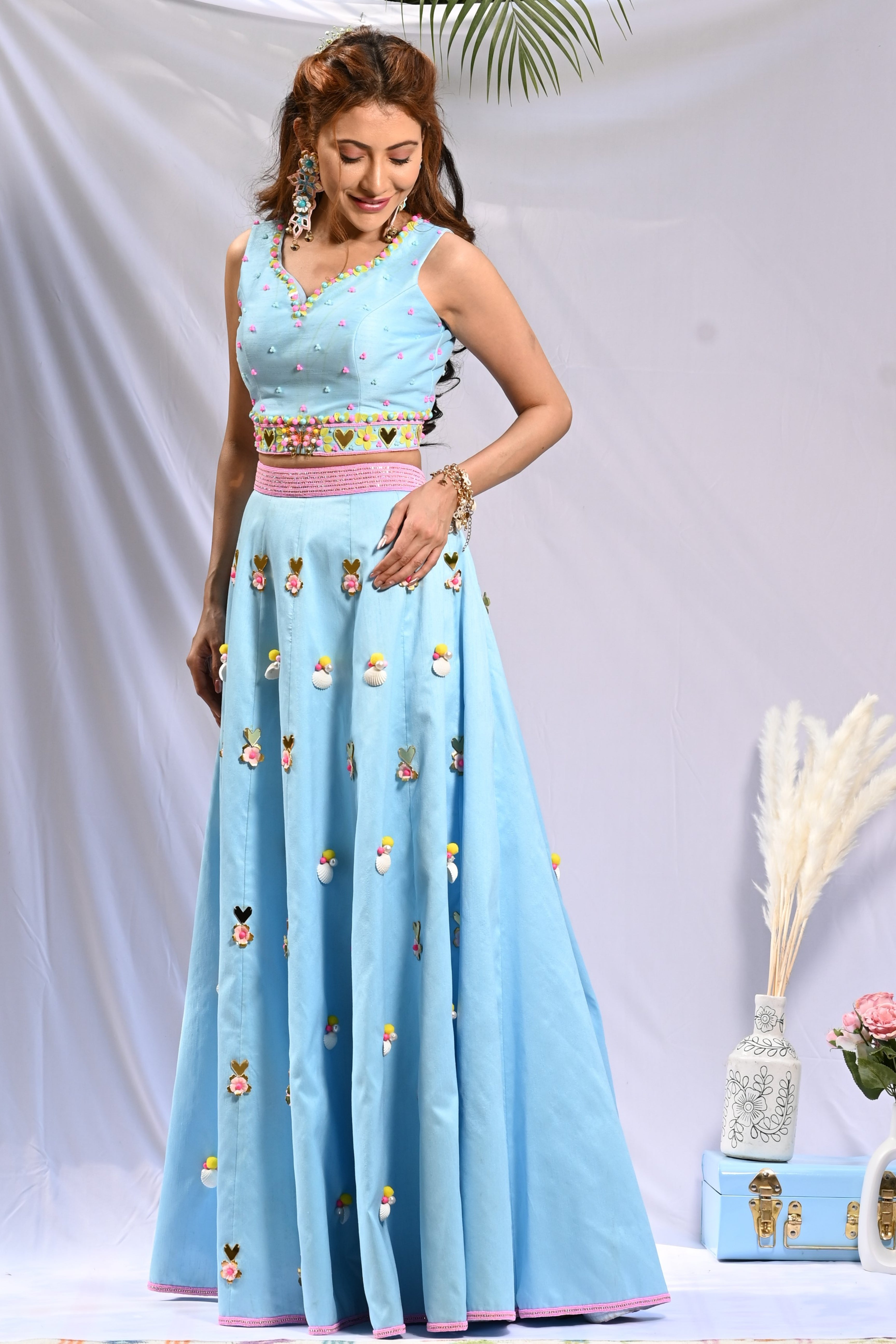 Sky blue hand embroidered lehenga with blouse