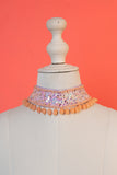 Sequins beaded choker with pearl drop .