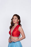 Red plunging neck blouse