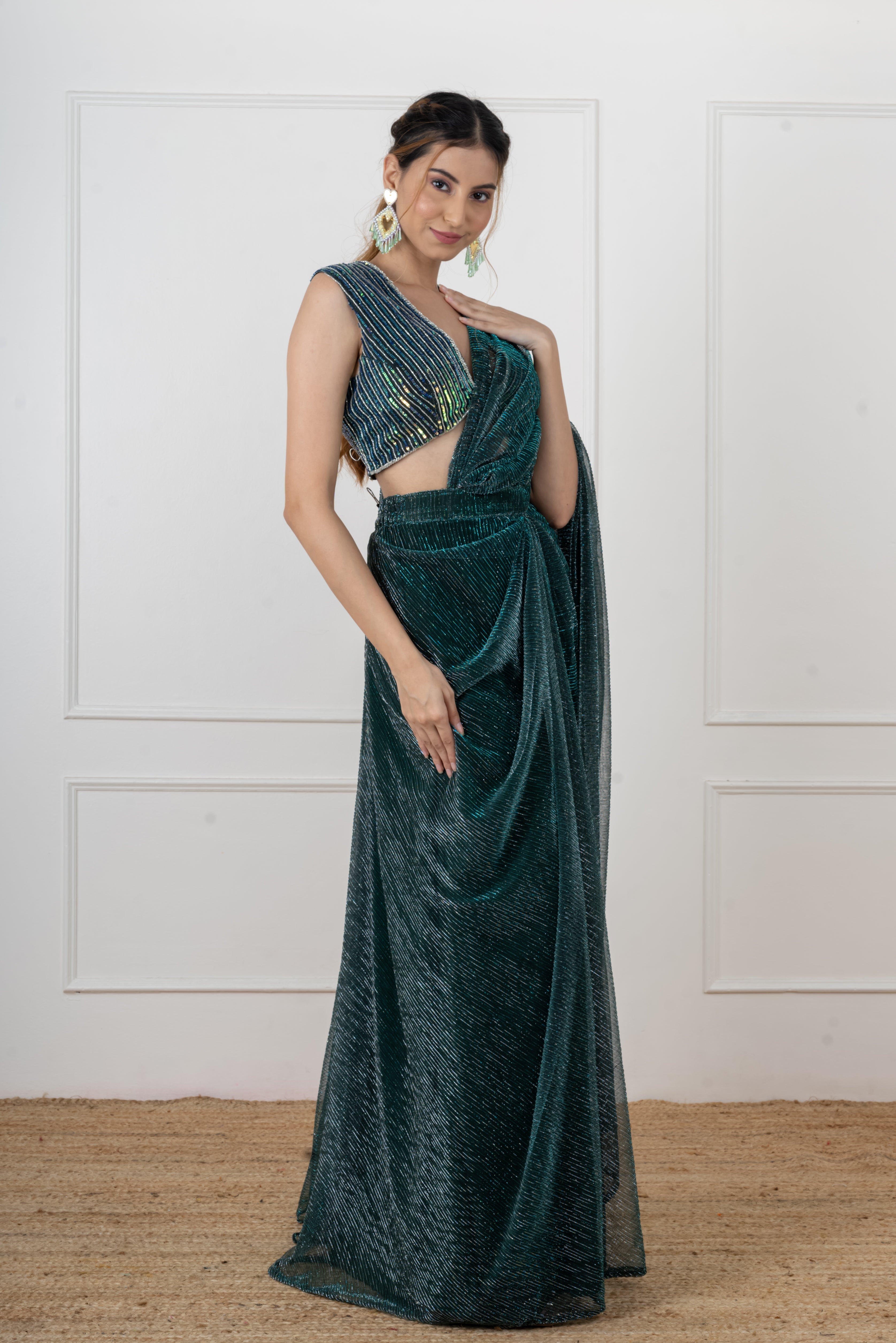 Bottle green draped saree