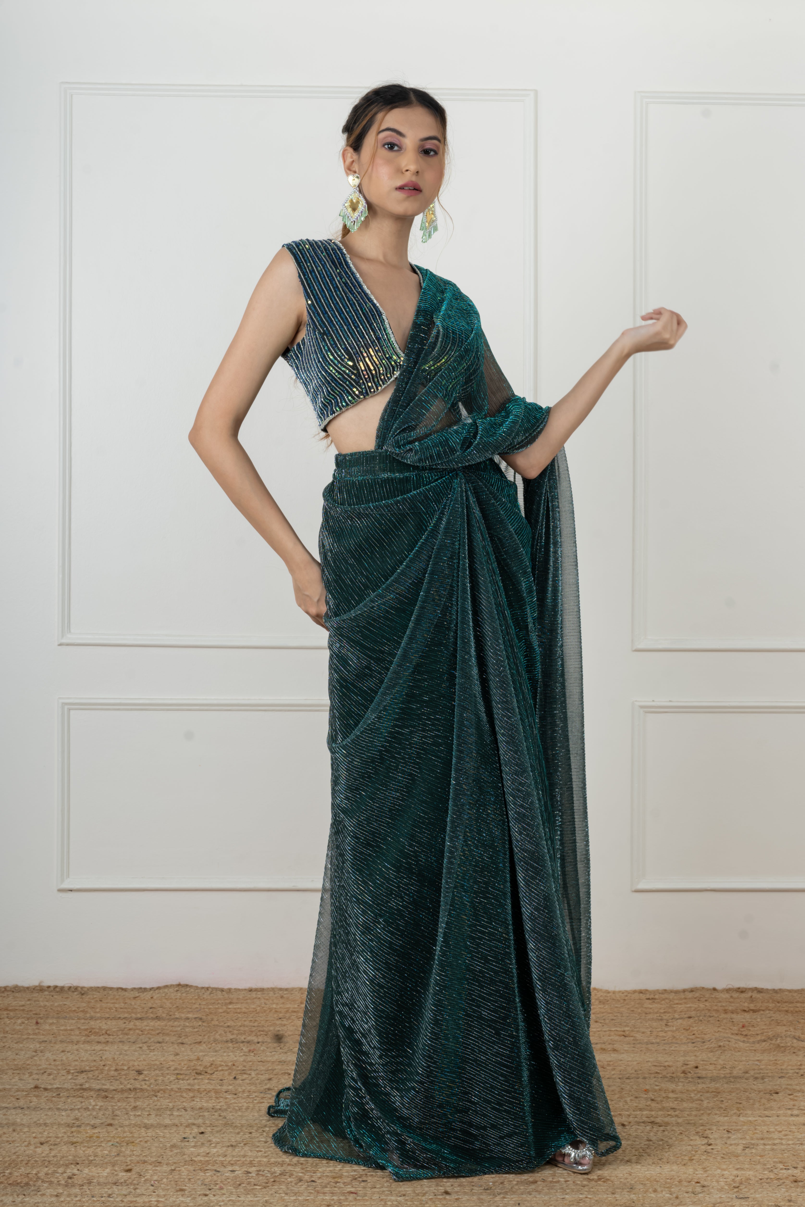 Bottle green draped saree