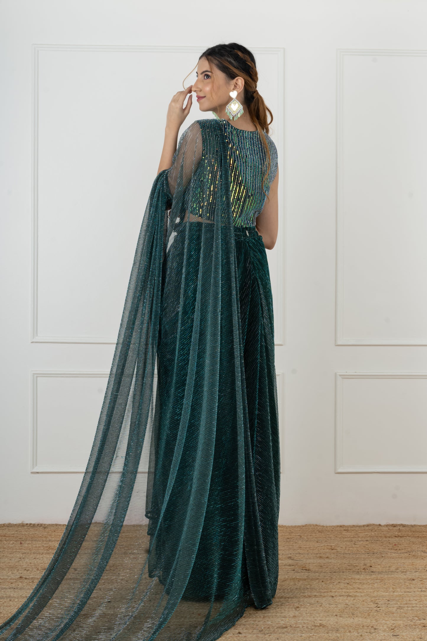 Bottle green draped saree