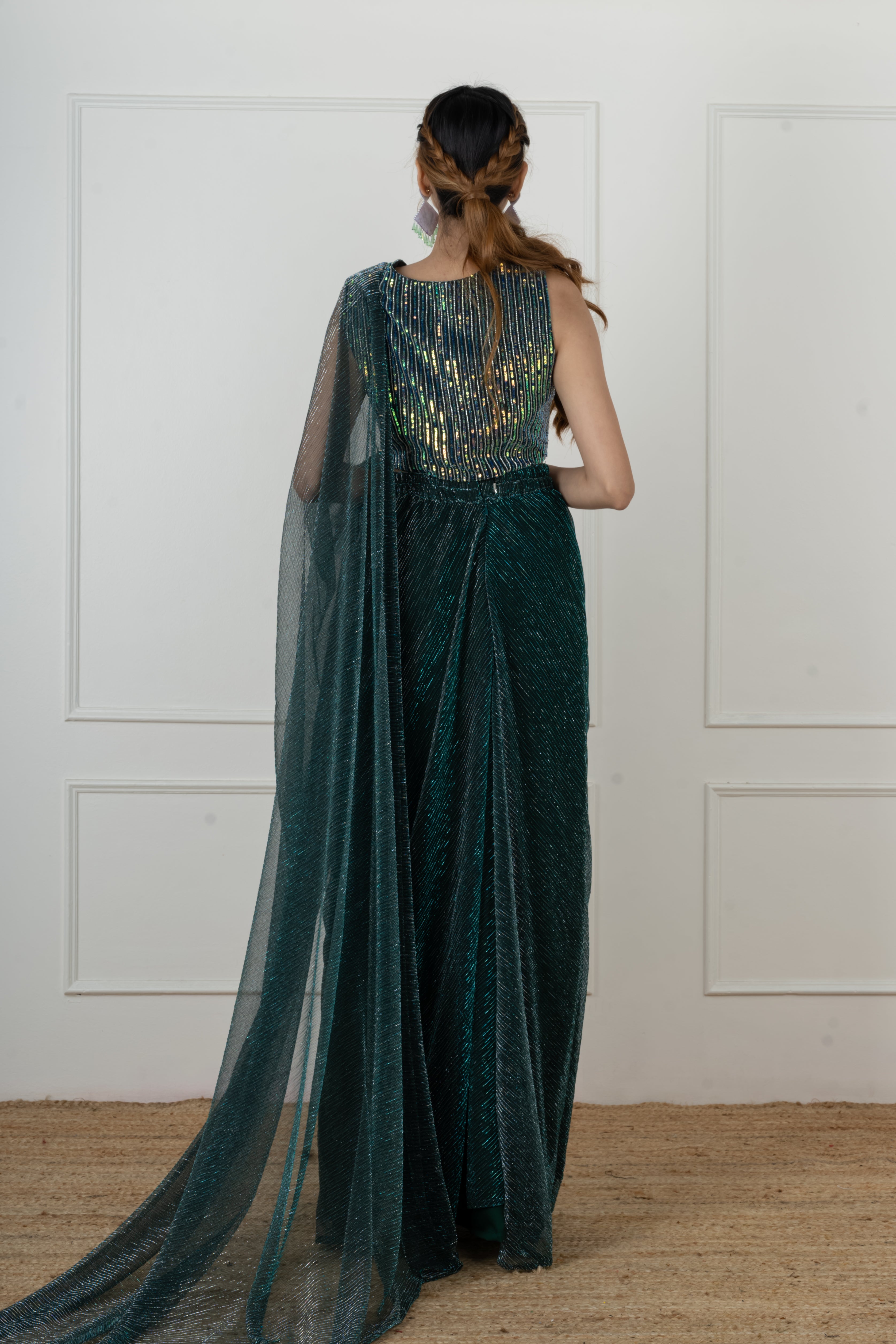 Bottle green draped saree