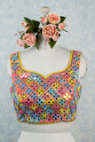 Multicolor mirror hand embroidered blouse.