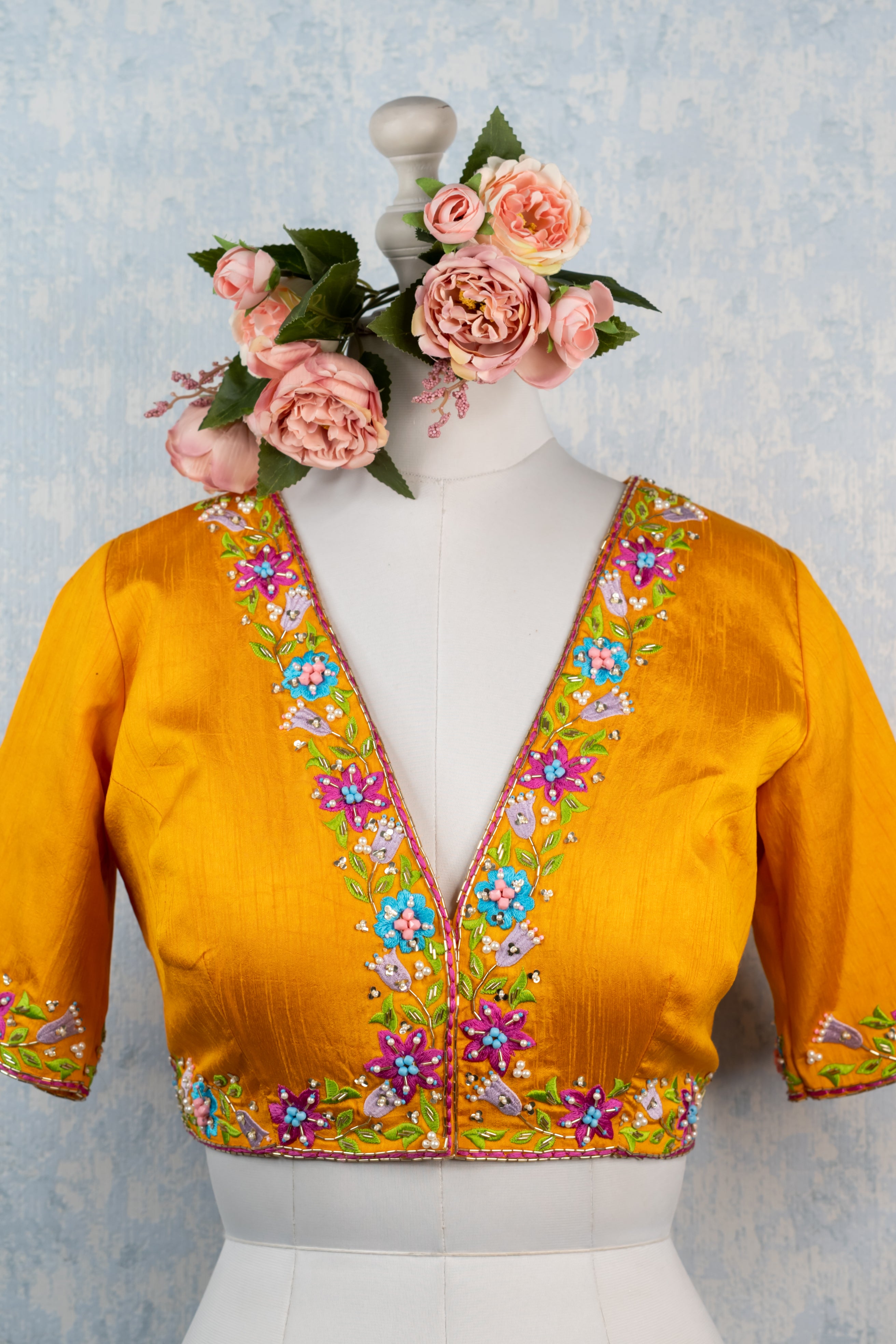 Orange hand embroidered blouse
