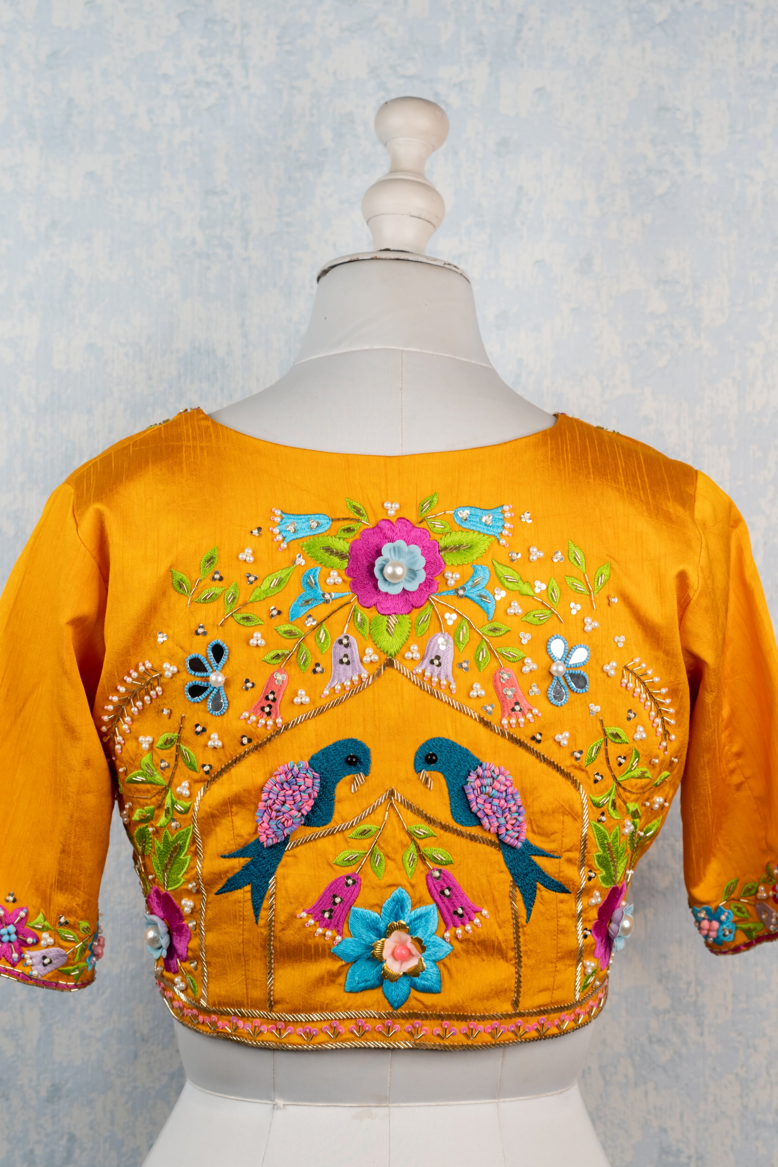 Orange hand embroidered blouse