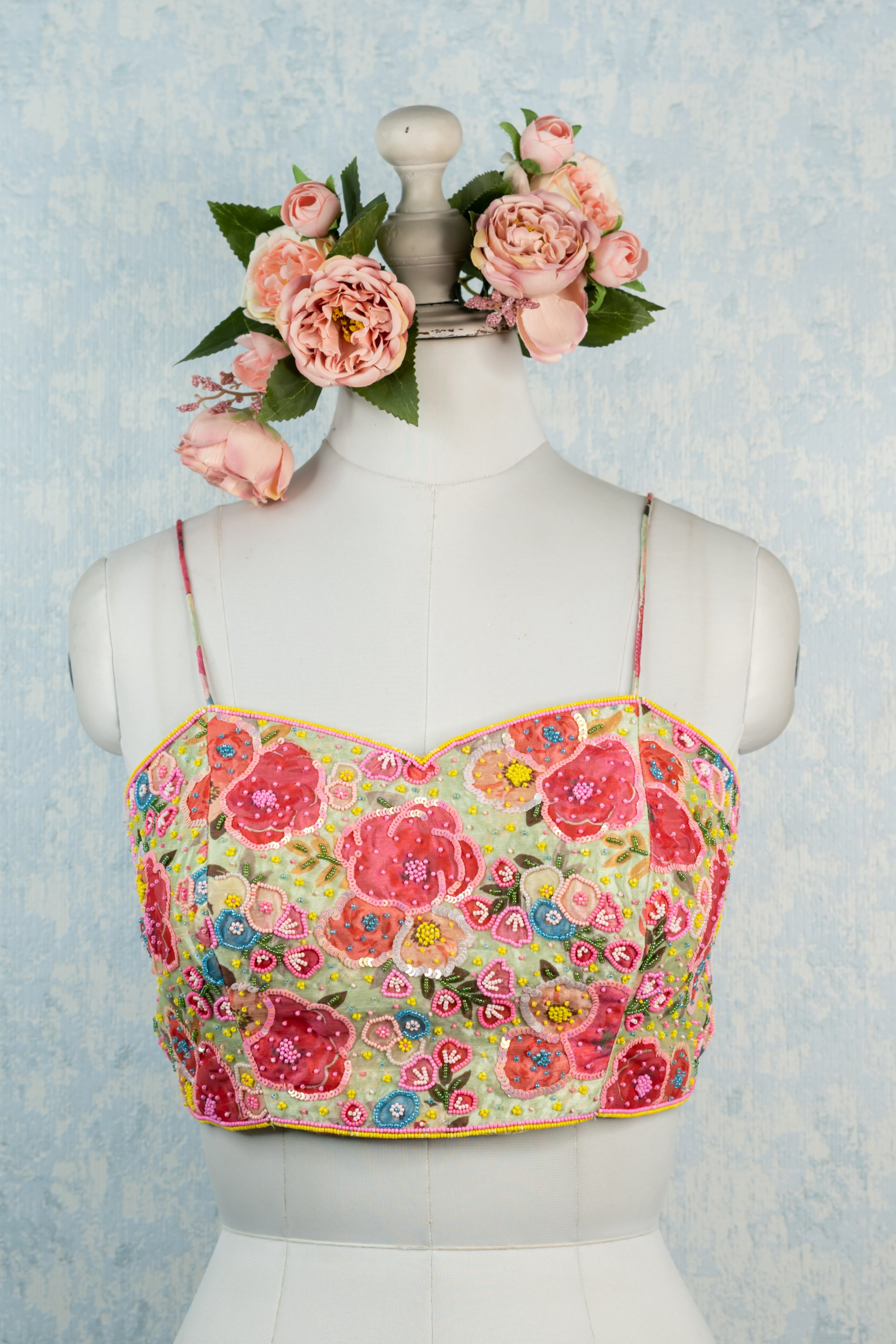 Multicolour floral handembroidered blouse.