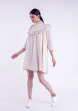 Off-white mini dress with cute ruffled neck, and elbow length puffy sleeves