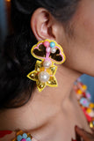 Yellow mirror & pearl beaded earrings .