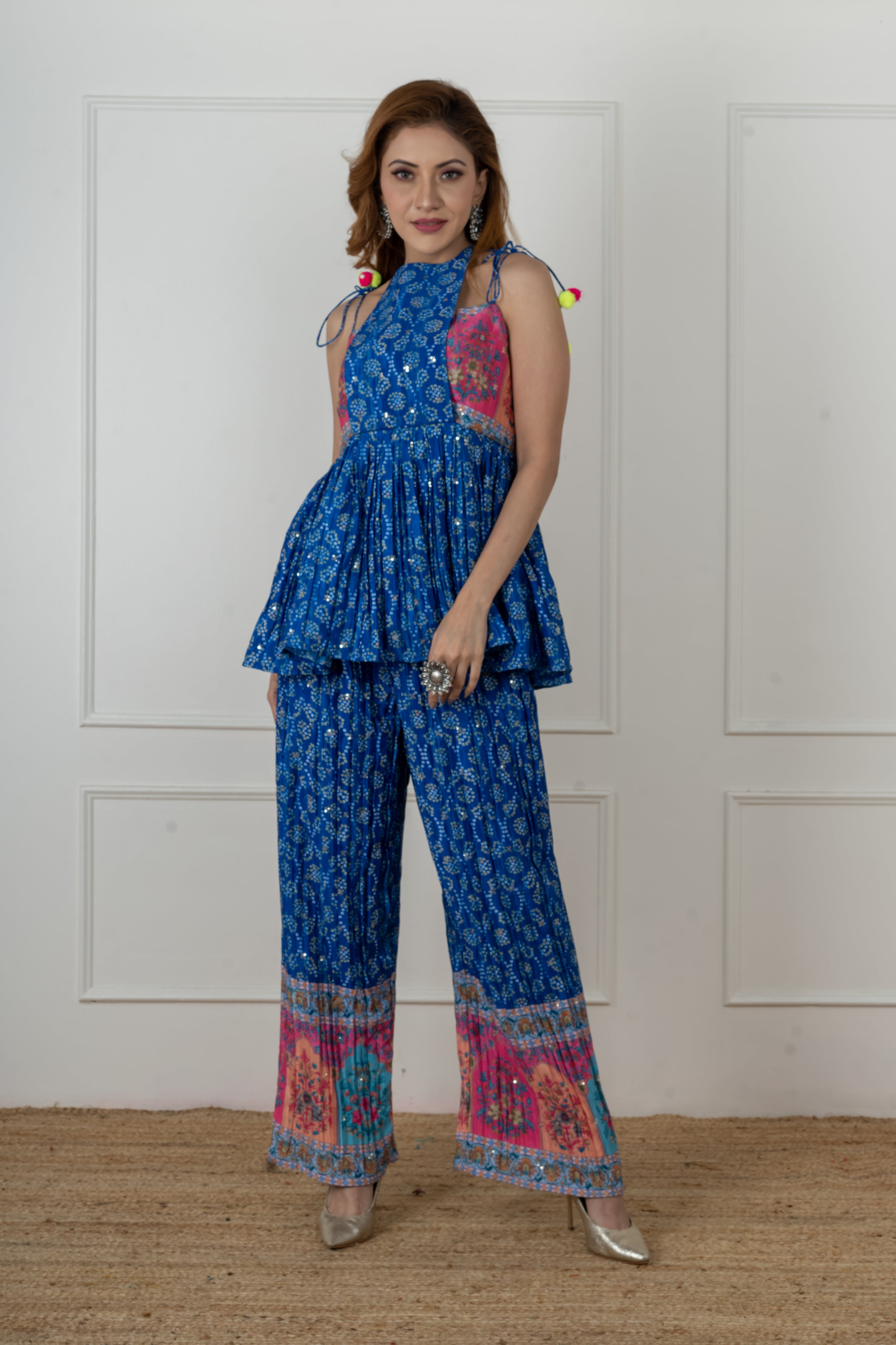 Bandhani print on blue silk kurta set for women, showcasing festive detailing