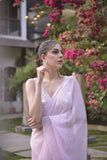 Pastel pink ruffle saree with mirror work blouse